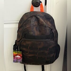 NEW. TrailMaker Camo Backpack with front skate straps.